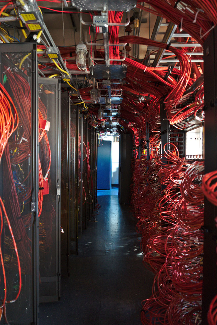 Full interior view of corridor with lots of red cables