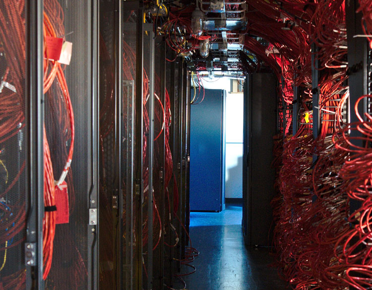 ICL interior corridor with lots of red cables in walls and ceiling