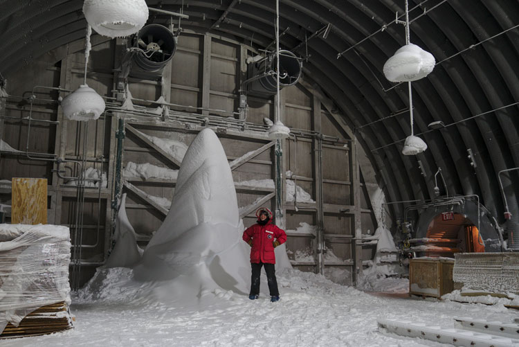 Huge snow drift inside a South Pole storage facility.