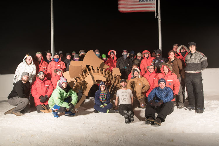 Group photo of roughly 30 to 40 South Pole winterovers