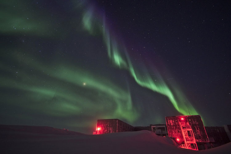 Auroras over South Pole station, seen from back