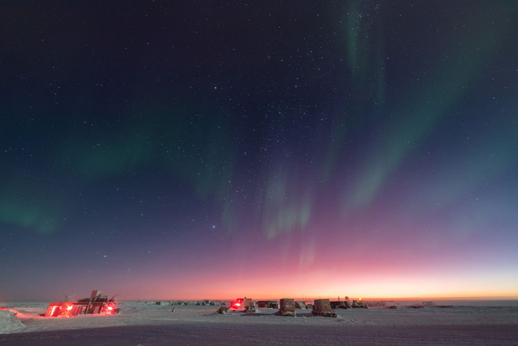 pink horizon, with starry sky and auroras