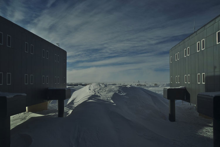 Huge snow drift between two wings of the South Pole station building