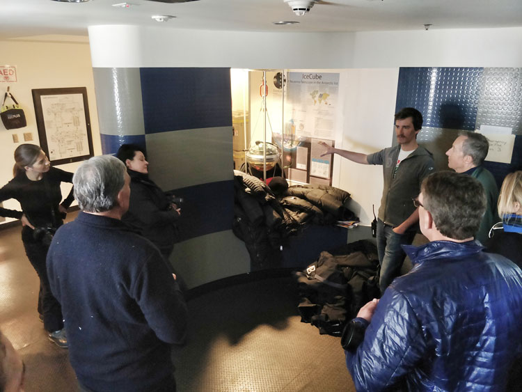 Group of people getting a tour inside South Pole station