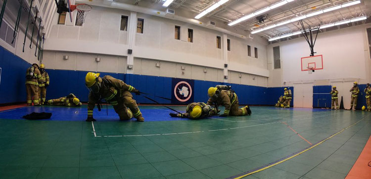 Fire teams practicing in gym