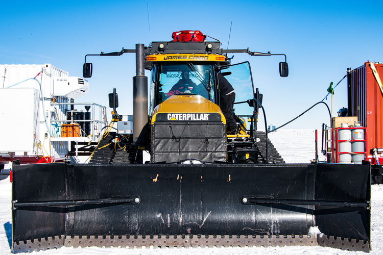 Close-up head-on view of catepillar snow tractor