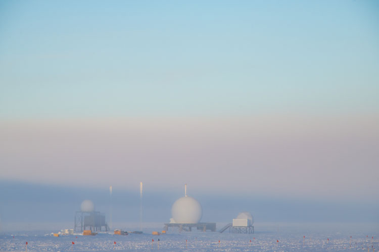 Hazy bands of color in sky at south pole sunset