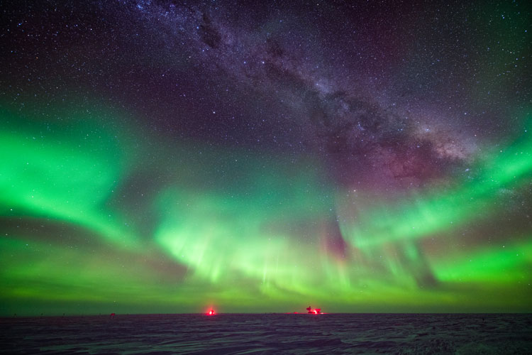 Stunning spread of aurora, with Milky Way peaking through above and behind