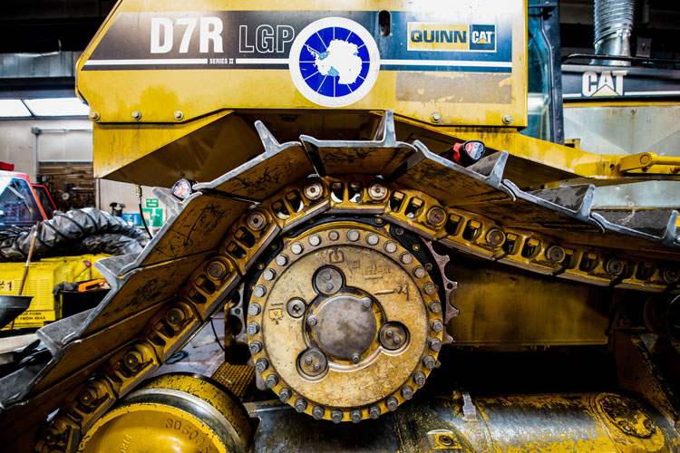 Close up on side of caterpillar snow vehicle