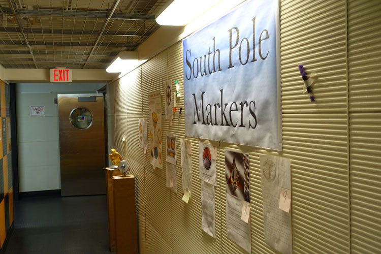 South Pole Markers sign and displays on wall