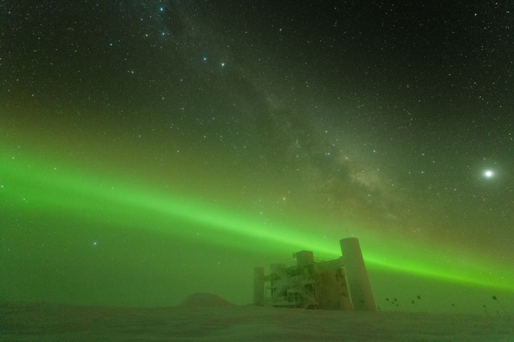 The IceCube Lab under green auroras