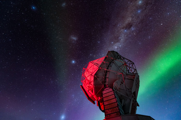 South Pole Telescope dish under starry sky