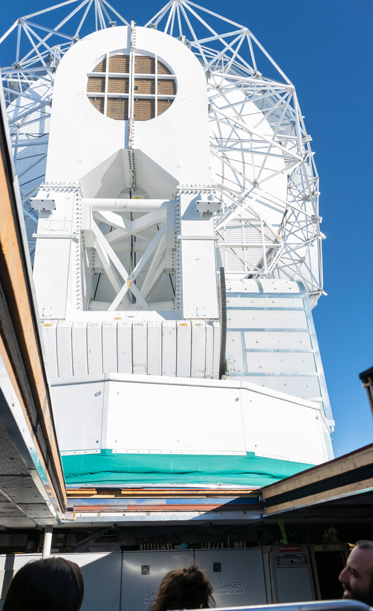 View of South Pole Telescope from below through opened roof.