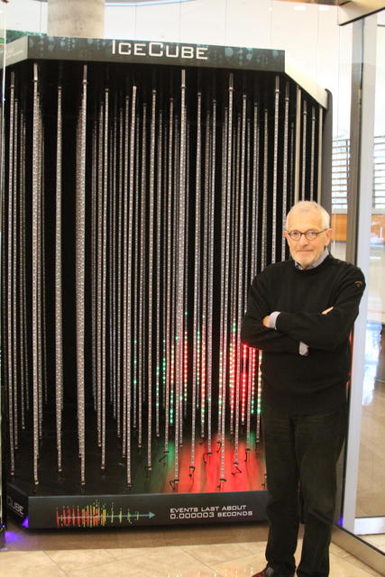 Francis Halzen in front of IceCube display