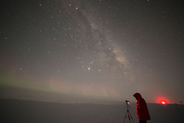 Winterover with camera on tripod