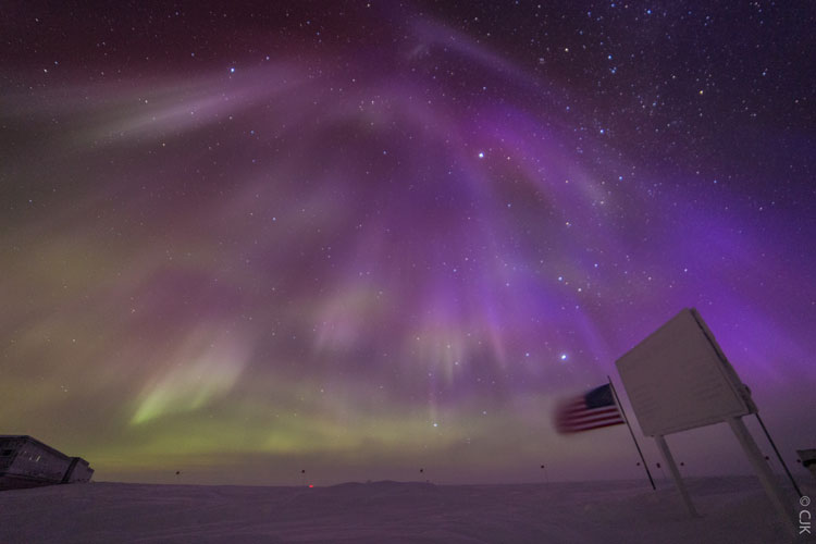 Purple auroras filling the sky at the South Pole