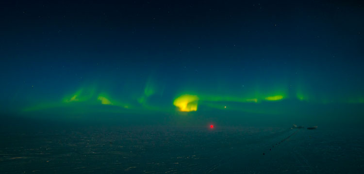South Pole horizon ablaze with auroras