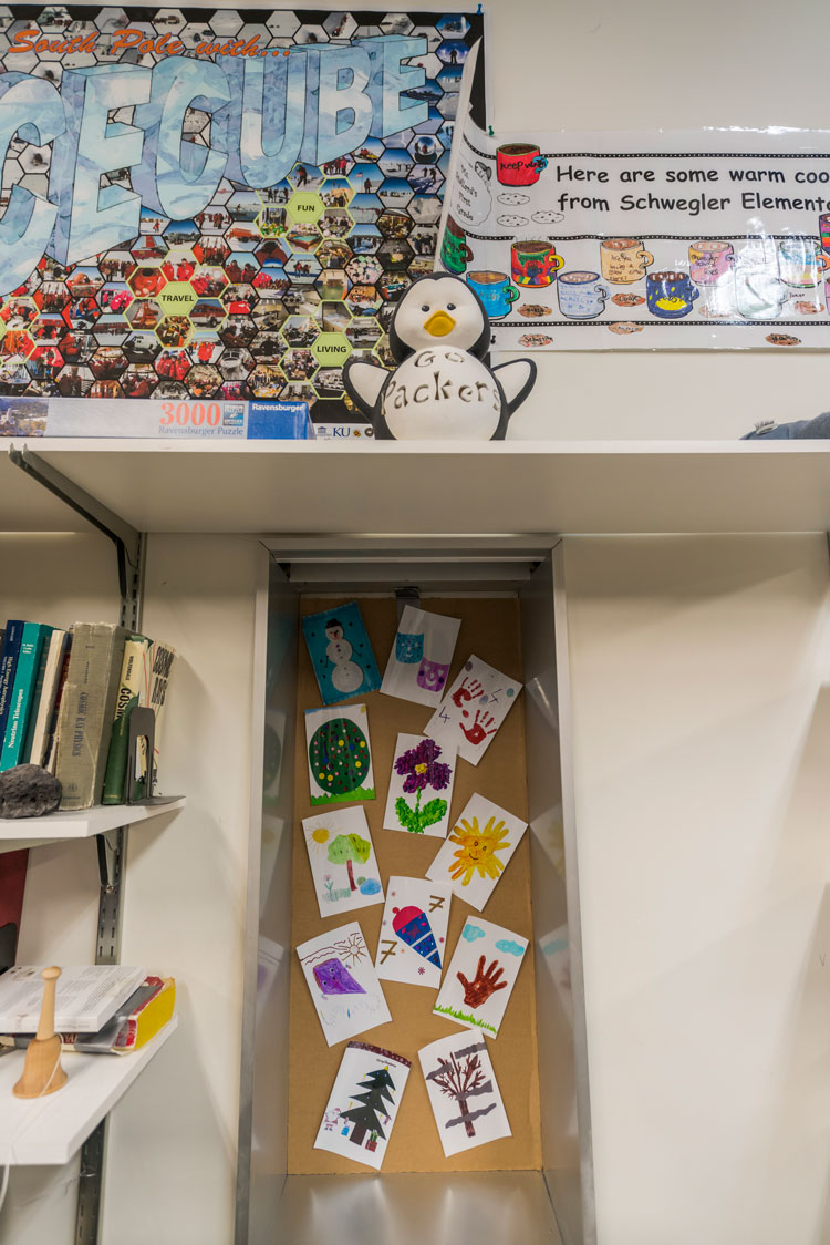 window covering decorated with cards