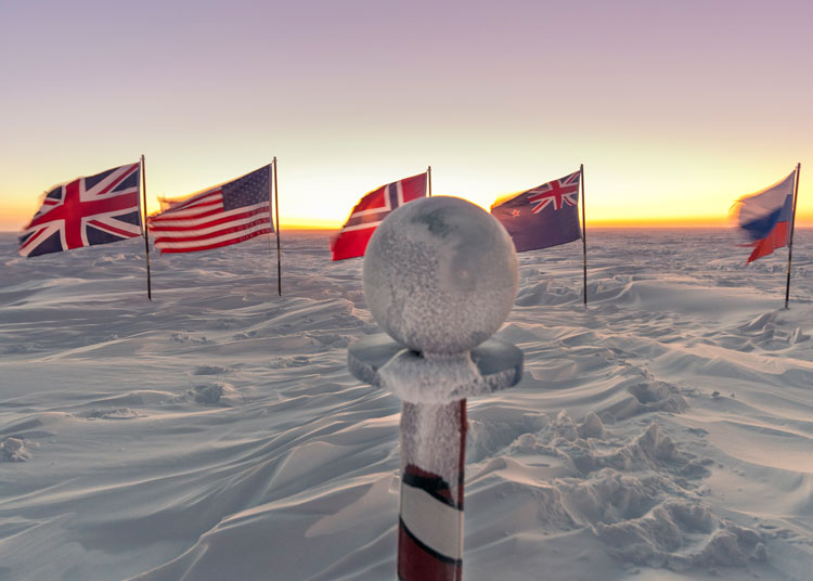 Frosted marker at twilight at ceremonial south pole