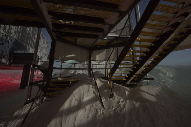 Snow drift covering staircase at South Pole station