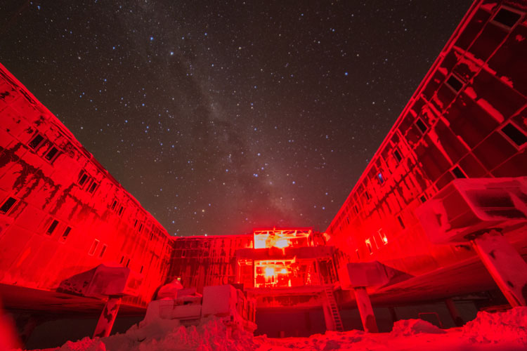 South Pole station's Destination Zulu lit up in red.