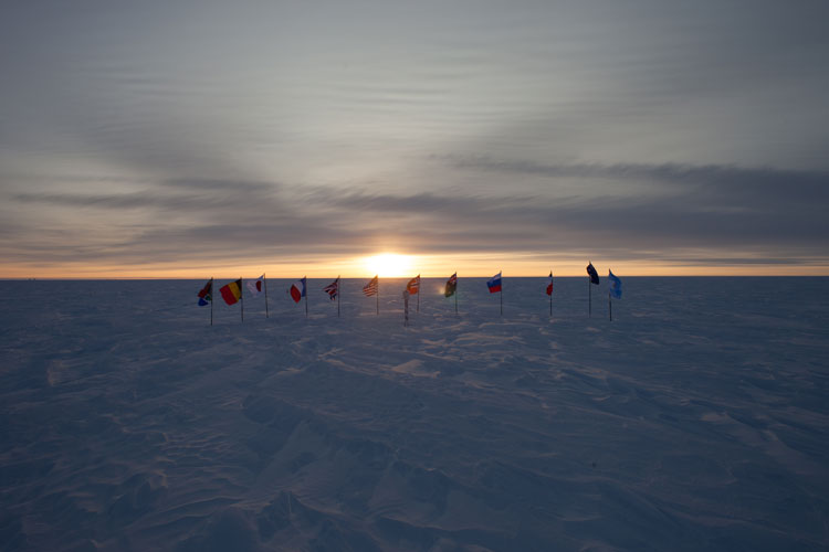 The sun is finally rising over the flags. 