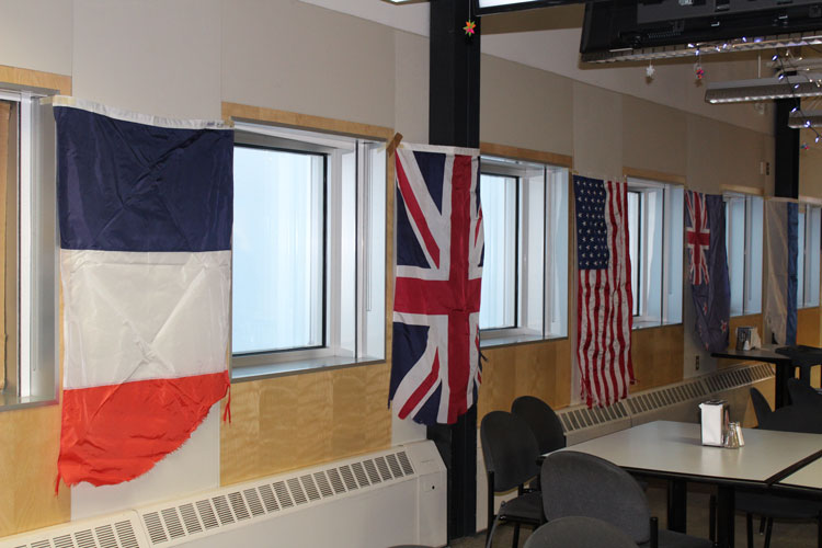 flags hanging on walls in South Pole galley