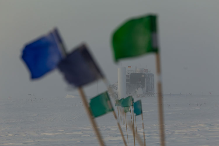 IceCube Lab with flag line in foreground.