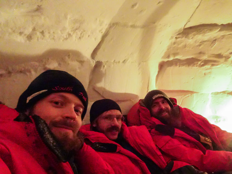 IceCube winterovers inside igloo