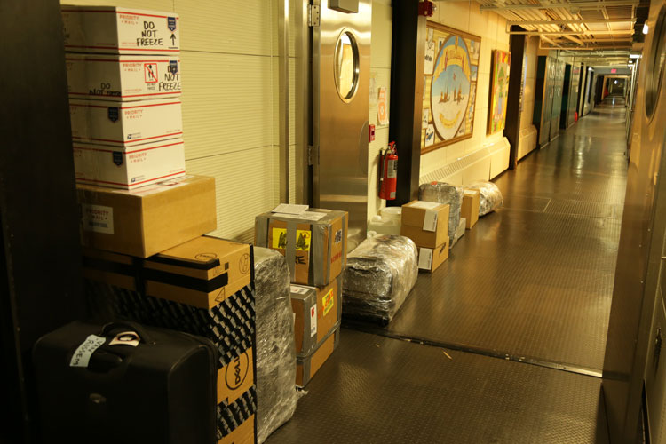 Luggage and boxes lining hallway of South Pole station