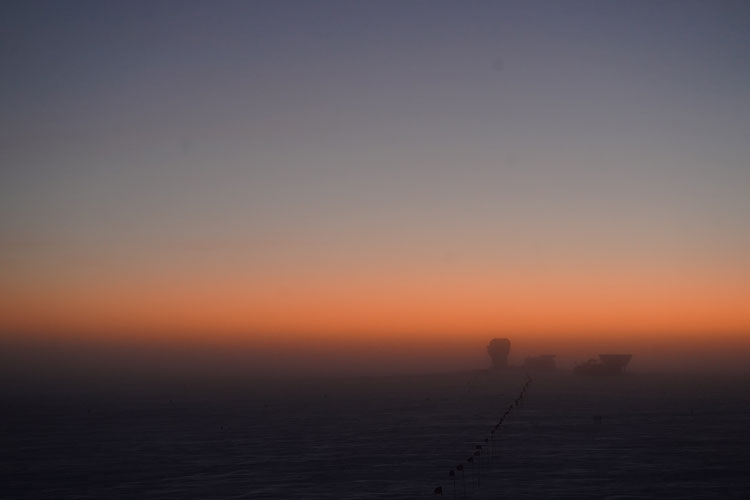 Orange horizon at South Pole sunrise
