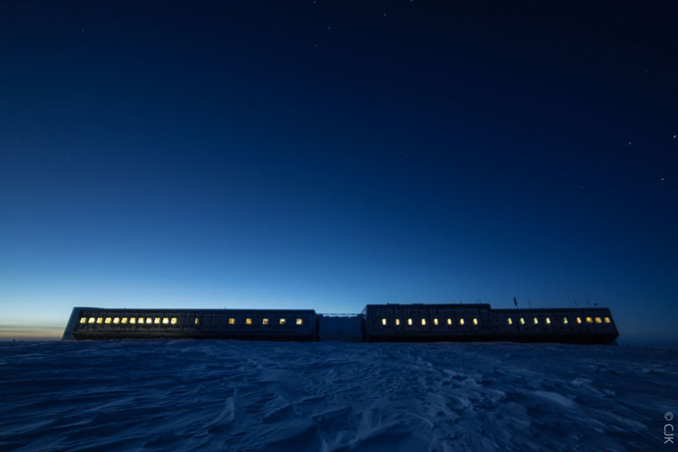 South Pole station at twilight with window coverings removed