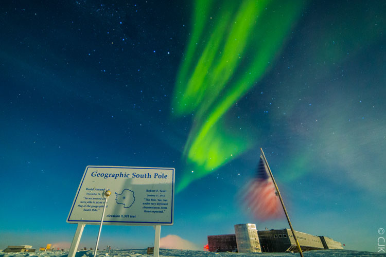 Bright aurora over South Pole, station in background