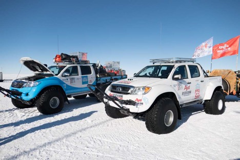 Two trucks on ice at South Pole