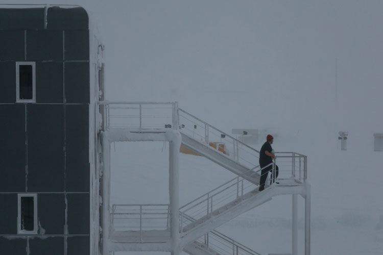 Climbing stairs outside South Pole station