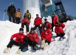 Crew sitting on the snow 