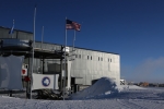 South Pole station, moon faintly visible in daylight